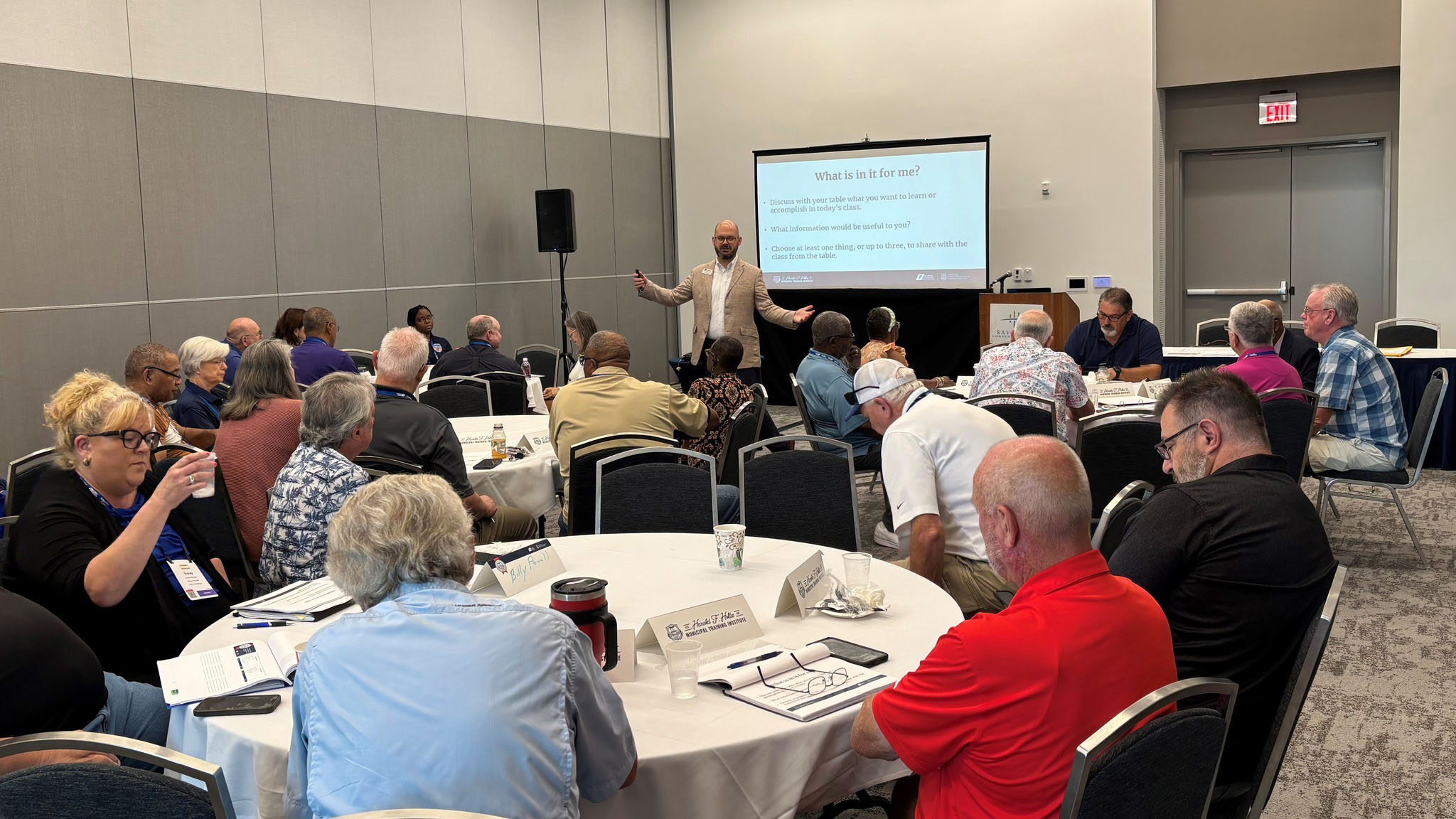 Taylor Hafley teaches a course at the GMA Annual Convention to a room full of attendees.