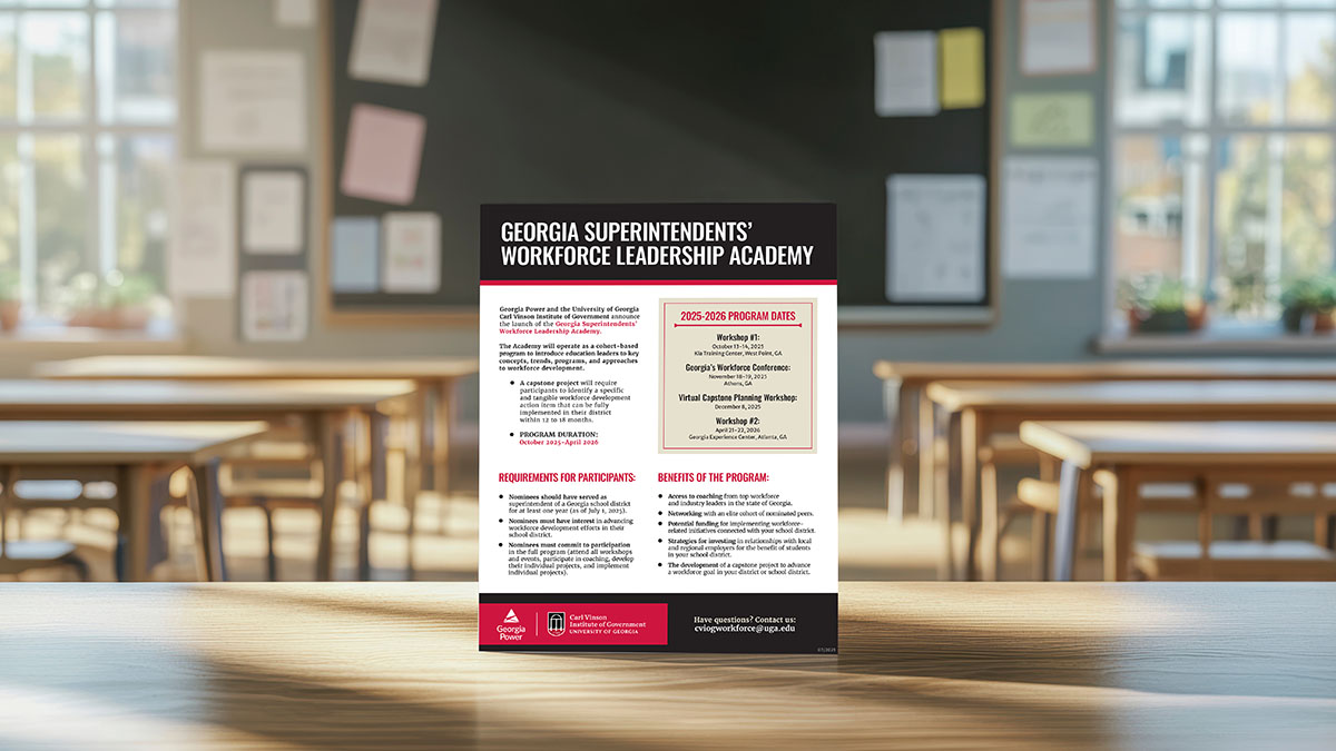 Flier about superintendent academy shown in a classroom